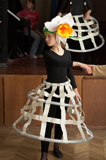 Flower headpieces out of lightweight coloured paper for a theatre production