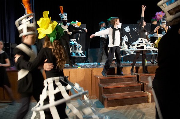 Flower headpieces out of lightweight coloured paper for a theatre production
