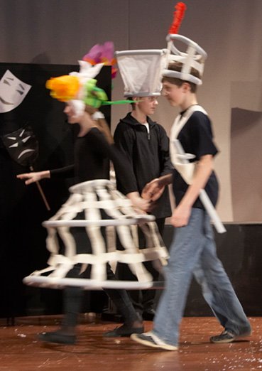 Flower headpieces out of lightweight coloured paper for a theatre production