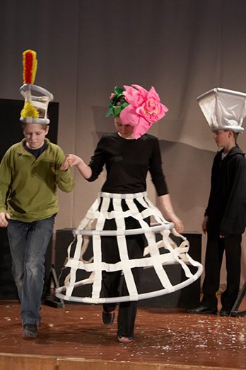Flower headpieces out of lightweight coloured paper for a theatre production