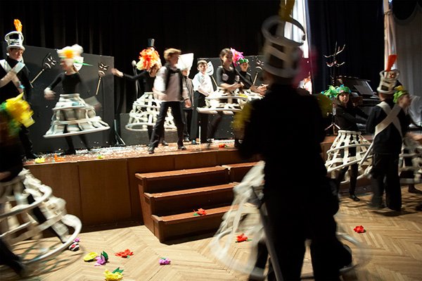 Flower headpieces out of lightweight coloured paper for a theatre production