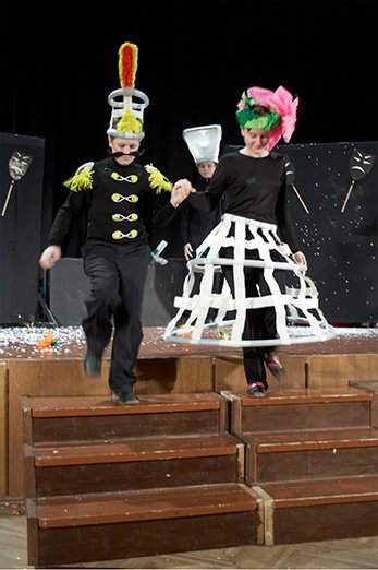 Flower headpieces out of lightweight coloured paper for a theatre production