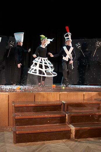 Flower headpieces out of lightweight coloured paper for a theatre production